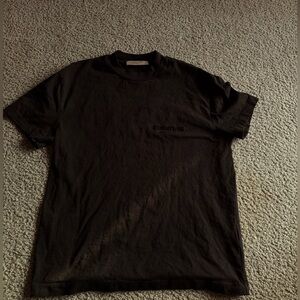 This is a Black Essentials men’s tee